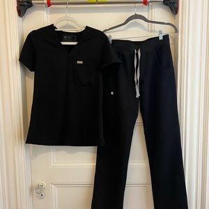Used Figs black scrubs. Top is xs, bottom is s